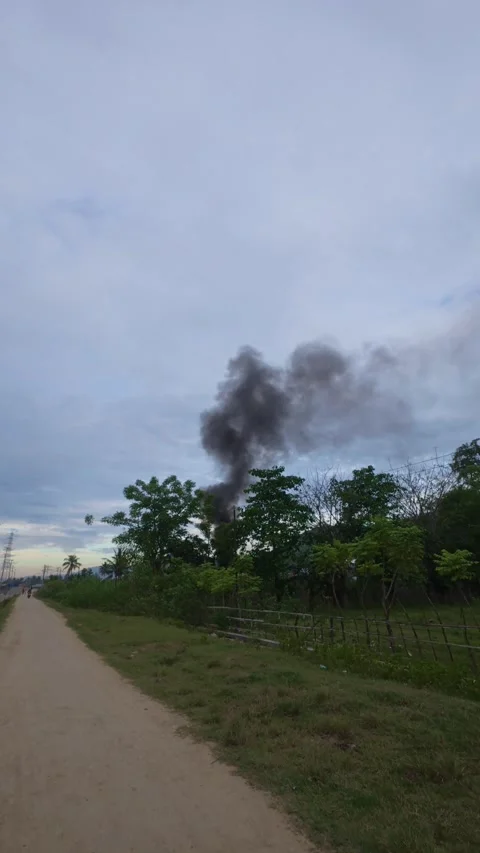 Smoke Emission from Distant Landscape Video stock 308779654