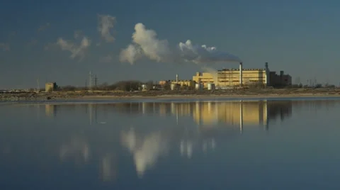 Smoke from factory, reflection on lake 스톡 동영상 35579560