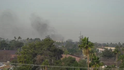 Smoke fire in distance Stock Footage 303172405