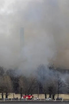 Smoke from a fire at a textile factory Stock Photos