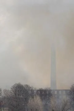 Smoke from a fire at a textile factory Stock Photos