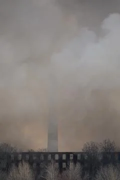 Smoke from a fire at a textile factory Foto stock
