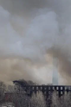 Smoke from a fire at a textile factory Stock Photos