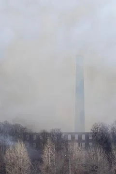 Smoke from a fire at a textile factory Stock Photos