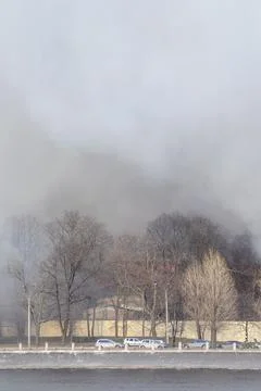 Smoke from a fire in a textile factory Stock Photos