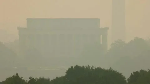 Smoke from fires in Canada blankets Washington and triggers air quality alert, W Stock Footage 339925610