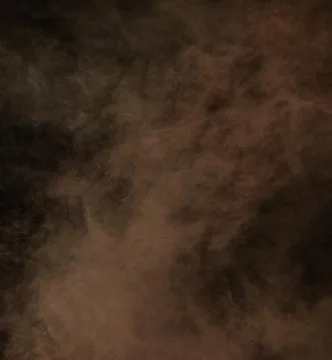 Smoke floating on a black background. Stock Photos