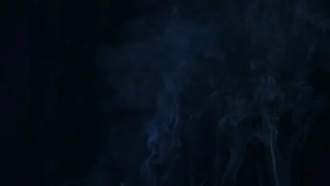 Smoke floating up slow motion on black background 스톡 동영상 220638026