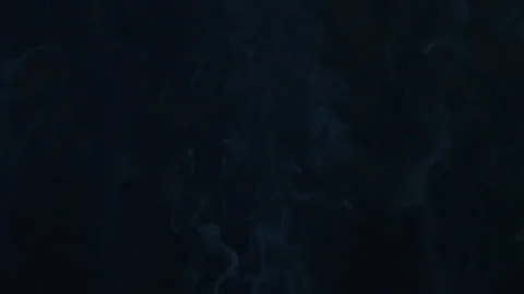 Smoke floating up slow motion on black background Stock Footage 220641277