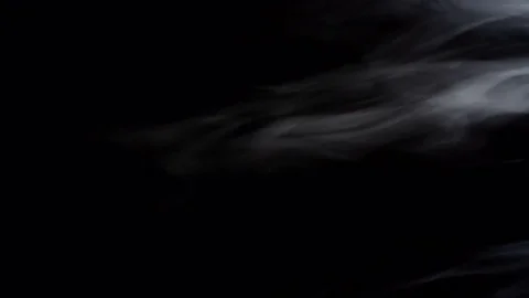 Smoke floating slowly in space on black background, 4k Stock Footage 76929899