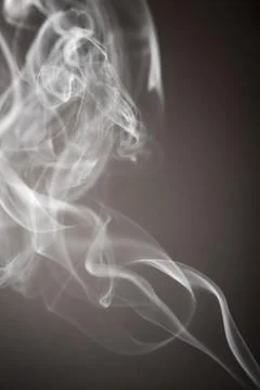 Smoke flows from an aromatic stick Stock Photos