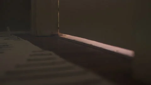 Smoke flows through a crack in a bedroom door in a house 스톡 동영상 134299398
