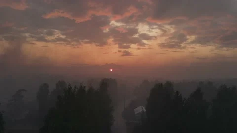 Smoke from forest fires at sunset 動画素材 162220813