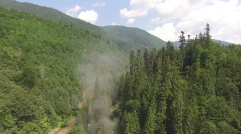 Smoke generated from  old train puffing Stock Footage 68936281