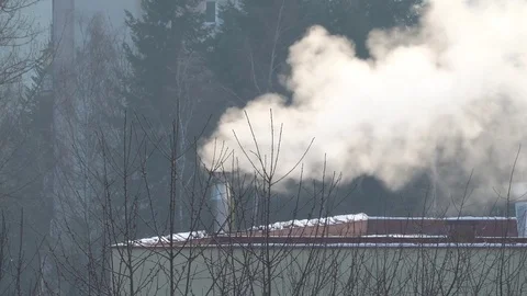 Smoke going out from the chimney in winter Stock Footage 83647538