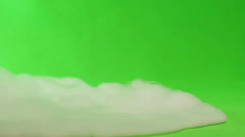 Smoke on green chroma key background. Smoking, steam clouds of vapour close-up Stock Footage 198250064