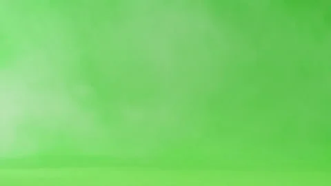 Smoke on green chroma key background. Smoking, steam clouds of vapour close-up Video stock 214978778