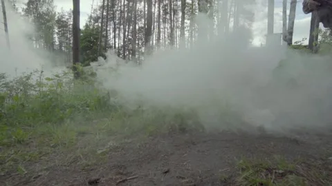 Smoke grenade explosion on polygon during lasertag game Stock-Footage 206683592