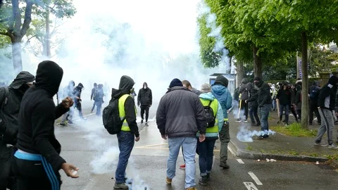 Smoke grenade launched by the police, cr... | Stock Video | Pond5