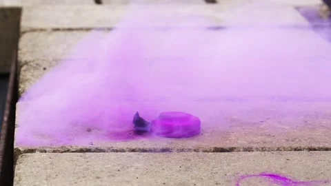 Smoke grenade release demonstration Stock Footage 333455453