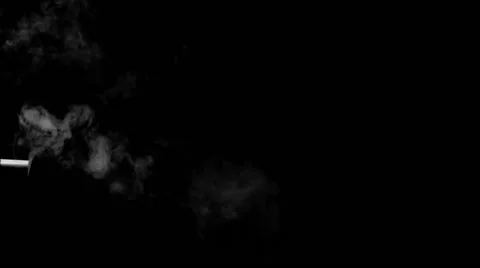 Smoke from a gun shot, from the left side, against black background Stock Footage 51065768