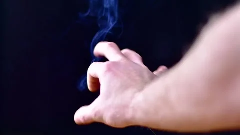 Smoke hand magicselective focus Stock Footage 257939952