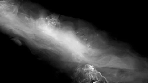 Smoke illuminated by a ray of light 스톡 동영상 100444869