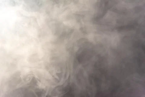 Smoke image in a black background Stock Photos