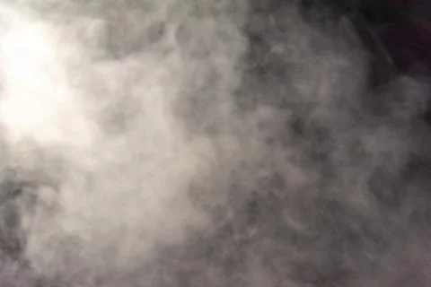 Smoke image in a black background Stock Photos