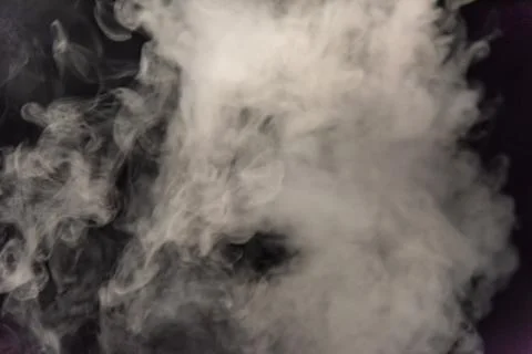 Smoke image in a black background Stock Photos