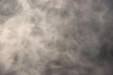 Smoke image in a black background Stock Photos