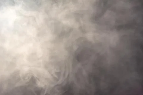 Smoke image in a black background Stock Photos