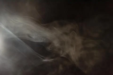 Smoke image in a black background Stock Photos