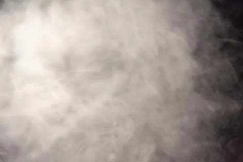Smoke image in a black background Stock Photos