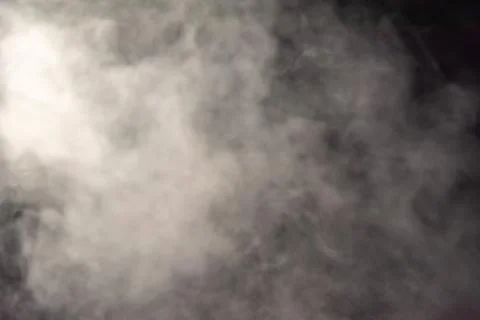 Smoke image in a black background Stock Photos