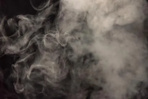 Smoke image in a black background Stock Photos
