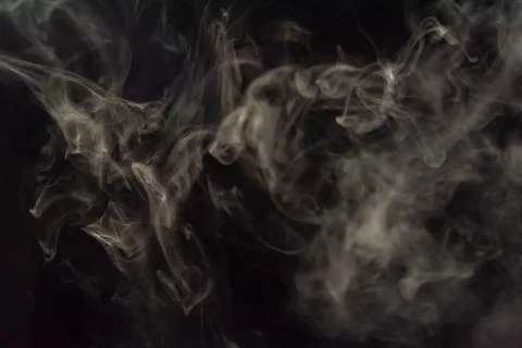 Smoke image in a black background Stock Photos