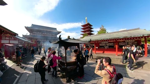 The smoke from the incense well inside Senso-ji temple in Tokyo Japan Stock Footage 129279706