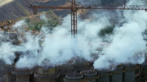 Smoke from industrial complex, Cotui, Dominican Republic. Aerial drone static Stock Footage 309773611