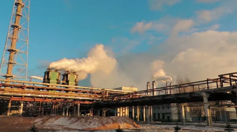 Smoke from large pipes at sunset (2) Video stock 48632501