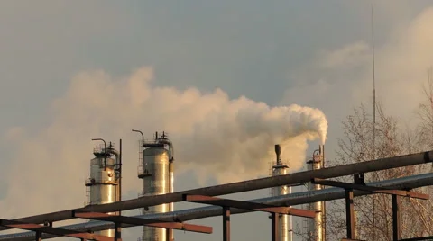 Smoke from large pipes at sunset (3) Video stock 48632502