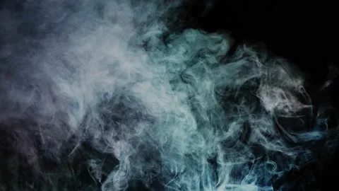The smoke is light white thick on a black background Stock Footage 201108214