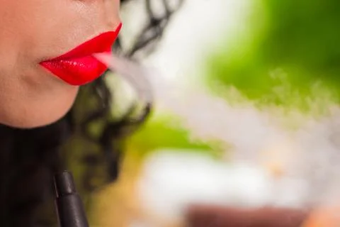 Smoke from the lips close Stock Photos