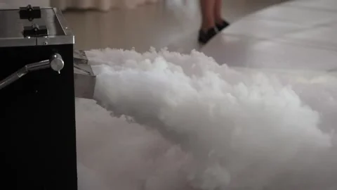 The smoke machine releases a large cloud of smoke onto the stage Stock Footage 140908477