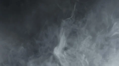 Smoke mist drifting dark background. White fog swirling black backdrop overlay. Stock Footage 345682190