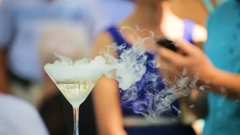 Smoke molecular drink on yard Stock Footage 82966255