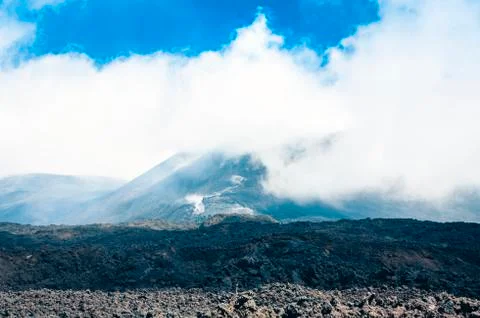 Smoke on Mount Etna, active volcano on the east coast of Sicily, Italy. Stock Photos