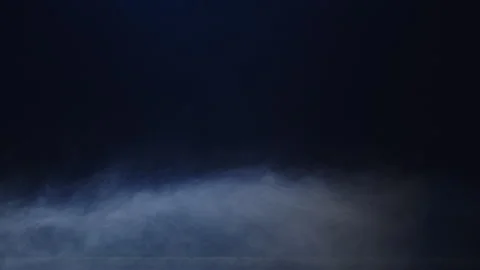 Smoke moving on a dark background Stock Footage 243765006