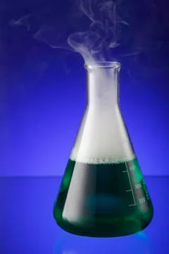Smoke out from the beaker 스톡 사진