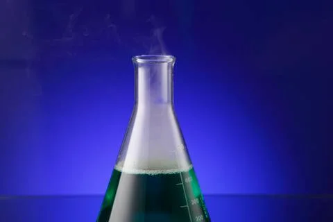 Smoke out from the beaker Stock Photos